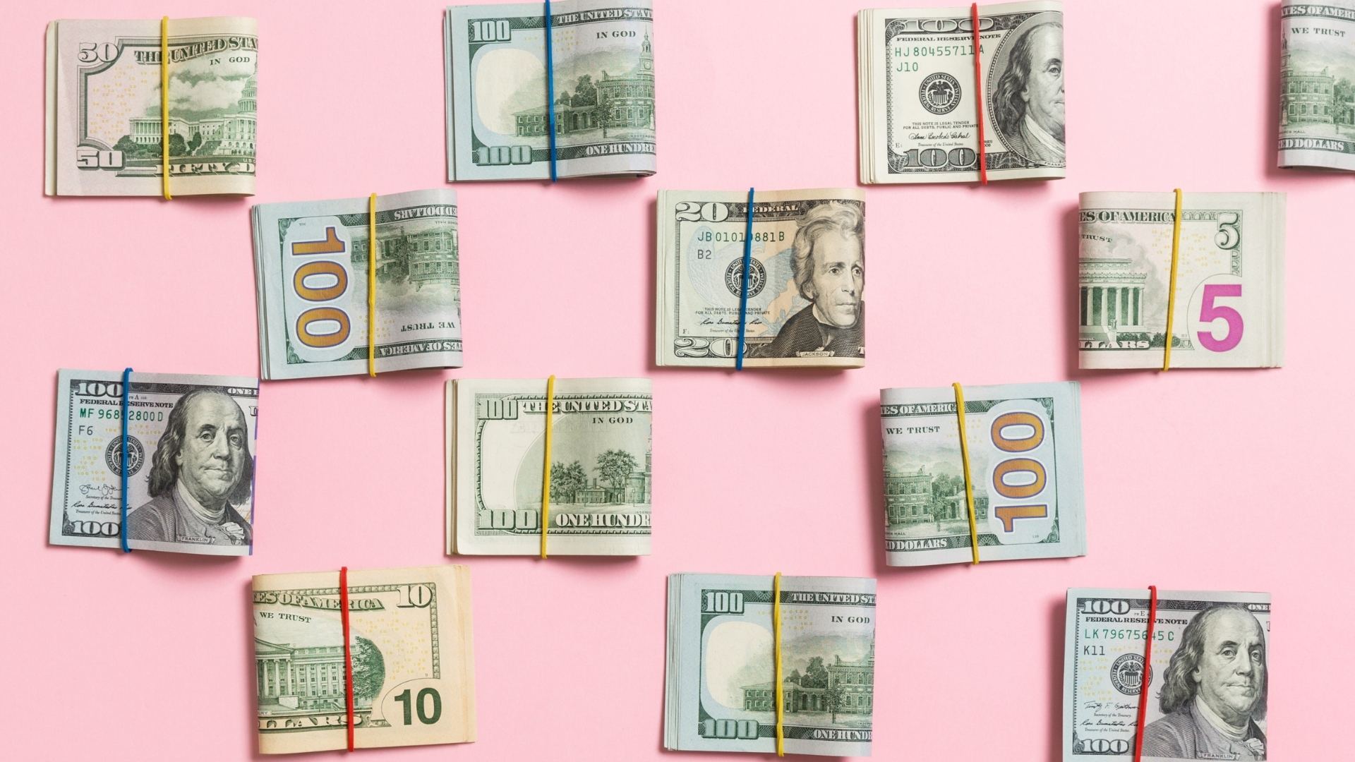 money on pink background